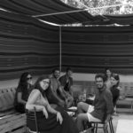 Group of students snacking in a typical Arabian tent in Amman, Jordan